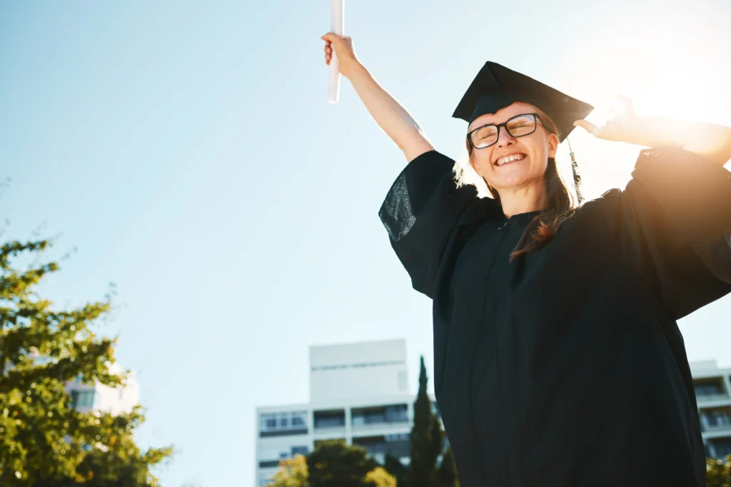 Expanded Core Curriculum. A young woman's with glasses is celebrating graduation. 